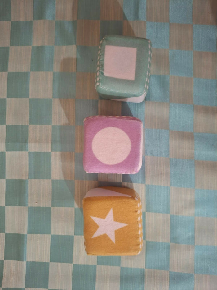 Curious cub rattle blocks