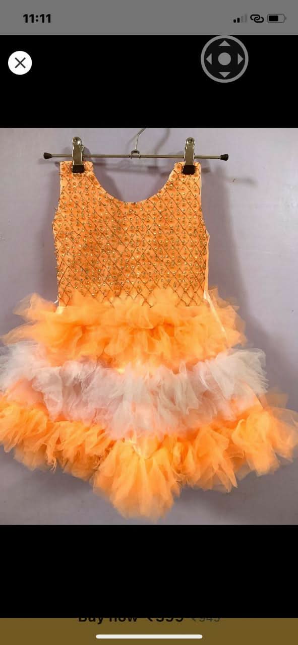 Dress your baby girl in enchanting elegance with our New Tulle Frock/Dress – crafted from delicate tulle fabric and featuring intricate detailing for special occasions.
