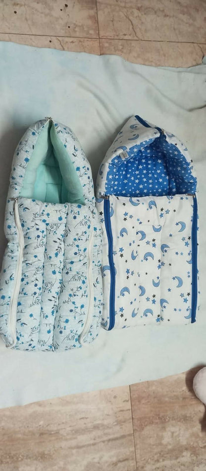 3-in-1 baby wrapper, sleeping sack, and carrier – a cozy sleeping pod for newborns.