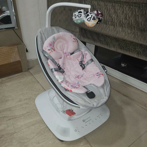 4moms mamaRoo Baby Swing with multiple soothing motions, adjustable speed settings, reclining seat, soft removable fabric, and interactive features designed to comfort and entertain babies during supervised use.