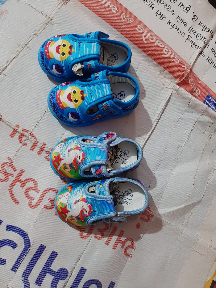 4 Pairs Of Baby Shoes