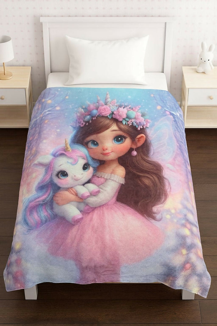 Blanket set with an illustration of a girl holding a unicorn on a bed.