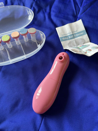 Pink baby nail trimmer with a clear container and instructions on a blue background