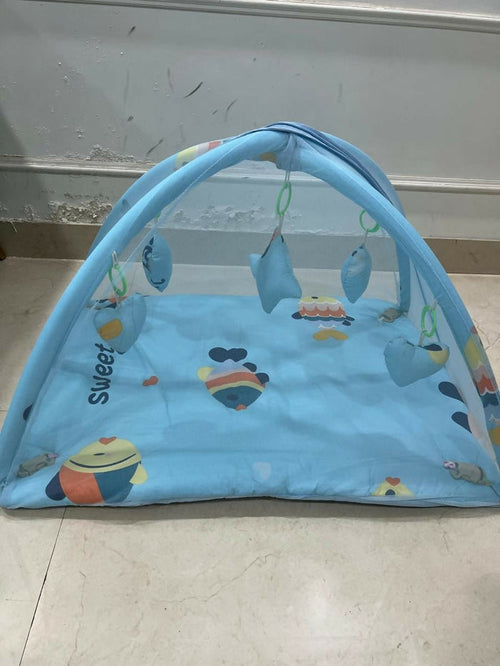 Baby bed with hanging toys featuring a soft cushioned sleeping area, protective sides, and colorful hanging toys to keep babies comfortable, engaged, and entertained.