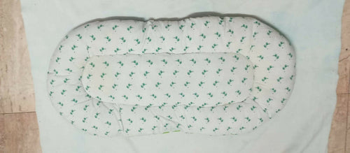 Soft and portable baby bed for newborns – perfect for home or travel.