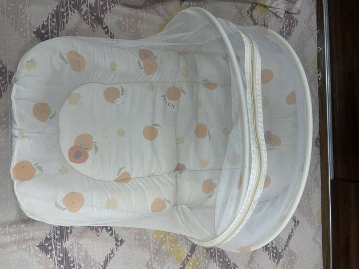 Baby bedding with mosquito net featuring a soft mattress, pillow, breathable fabric, and protective mosquito net for a cozy, comfortable, and secure sleeping space for babies.