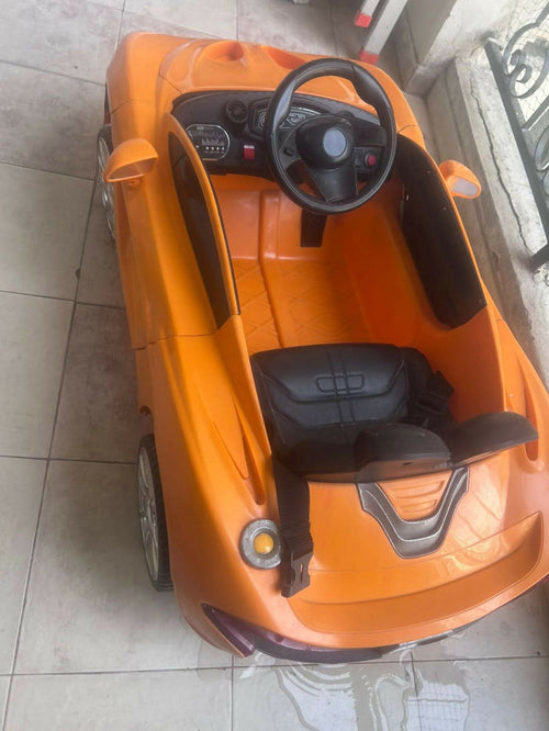 Buy Orange Baby Car – bright, safe, and fun ride-on for toddlers.