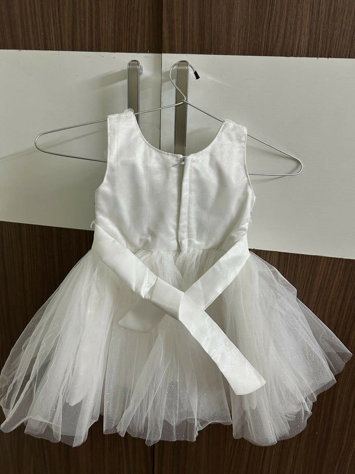 White dress with a sheer overlay