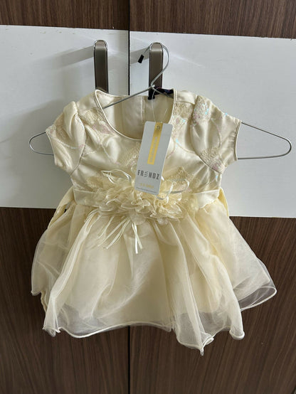 Yellow dress with a tag