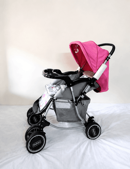 Babyhug Reversible Handle Baby Stroller Pram B118 with reclining seat, reversible handle, 5-point safety harness, protective canopy, smooth wheels, and foldable design for comfortable everyday outings with babies and toddlers.