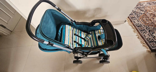 BABYHUG 2-in-1 Rock & Roll Stroller/Pram Cum Rocker with a convertible stroller and rocker design, reclining seat, reversible handle, adjustable canopy, 5-point safety harness, and foldable frame for versatile everyday use.