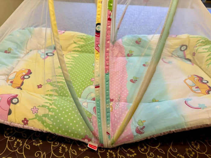 BABYHUG baby bed with mosquito net – safe, soft, and travel-friendly.