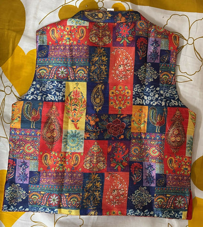 Colorful patchwork vest on a white and yellow floral background