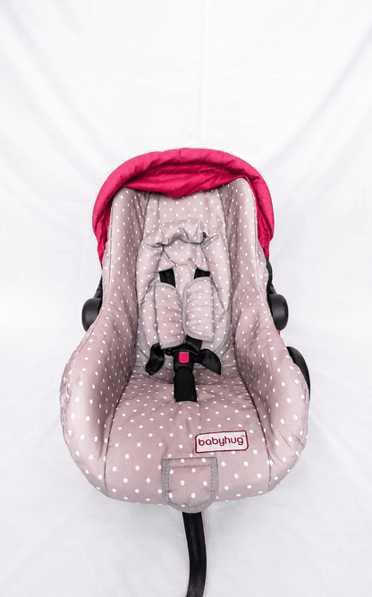 BABYHUG infant car seat carry cot with baby carrier function, rear-facing design, cushioned seat, secure safety harness, and carry handle for newborns and infants up to 13 kg.