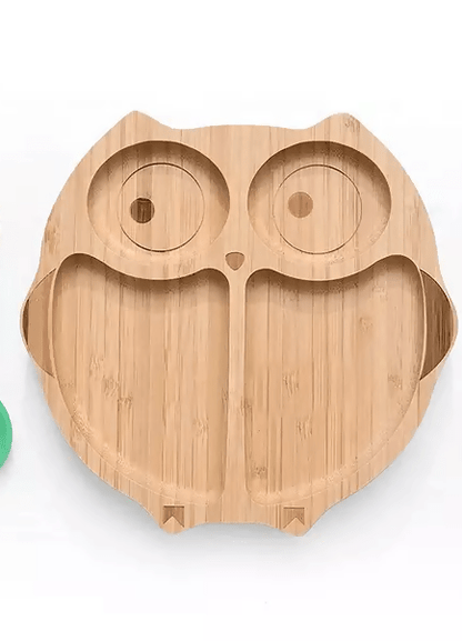 Bamboo plate with a strong silicone suction base, divided sections, smooth rounded edges, and eco-friendly food-grade construction for mess-free baby and toddler mealtimes.