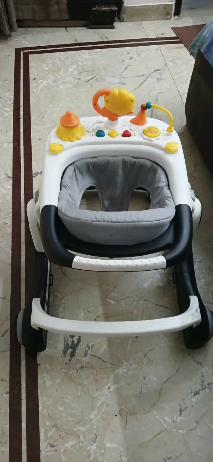 BAYBEE Astro 2-in-1 baby walker – convertible seated & push walker with music, height adjustment & safety features.