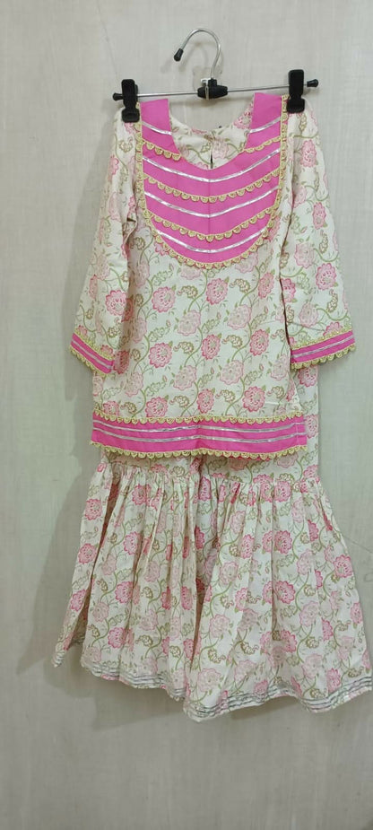 Dress your little darling in the Pink Floral Print Garara Set - a perfect blend of elegance and playfulness for her special occasions.