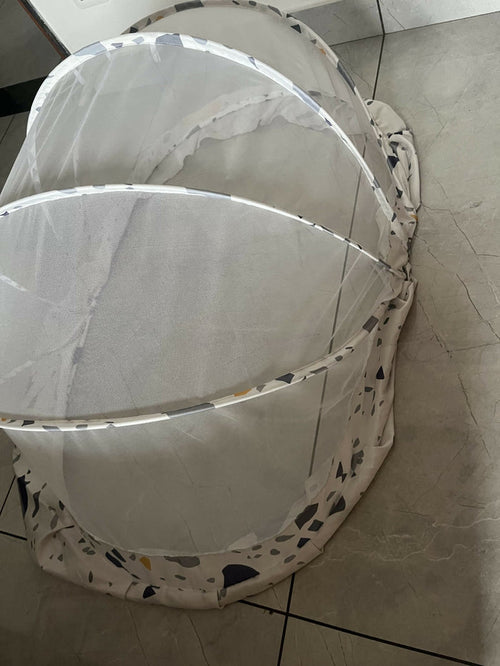 Large mosquito net made from fine breathable mesh with full-coverage protection, lightweight construction, and easy installation for cribs, beds, cots, or sleeping areas.