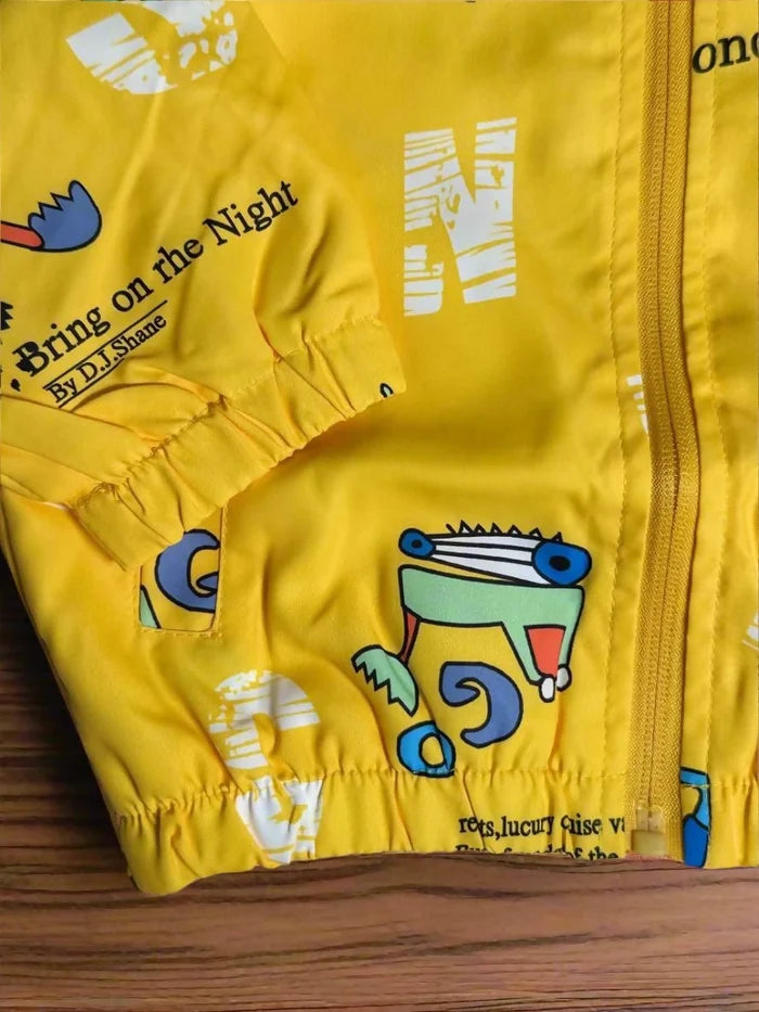 Yellow jacket with cartoon designs and text