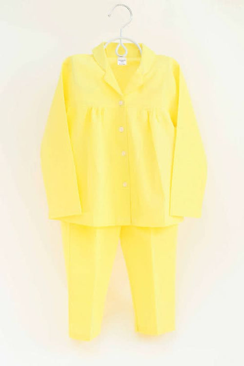 Shop bright yellow 100% cotton nightwear for girls, offering softness and comfort for a restful night's sleep.
