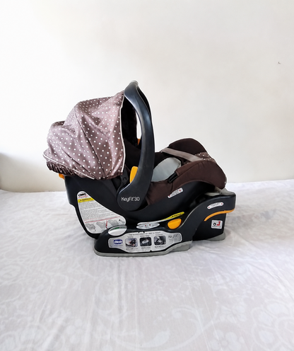 Chicco KeyFit 30 Infant Car Seat B130 with Stay-in-Car Base in Some Used condition, available in Chennai, Tamil Nadu, suitable for infants 4–30 lb with padded seating, safety harness, and secure base installation.