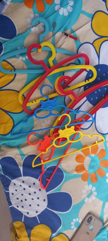 Add a splash of fun and organization to your child's closet with these colorful small hangers, specially designed to hold baby and toddler outfits perfectly.