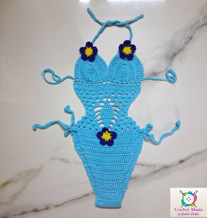 Blue crochet swimsuit with floral details