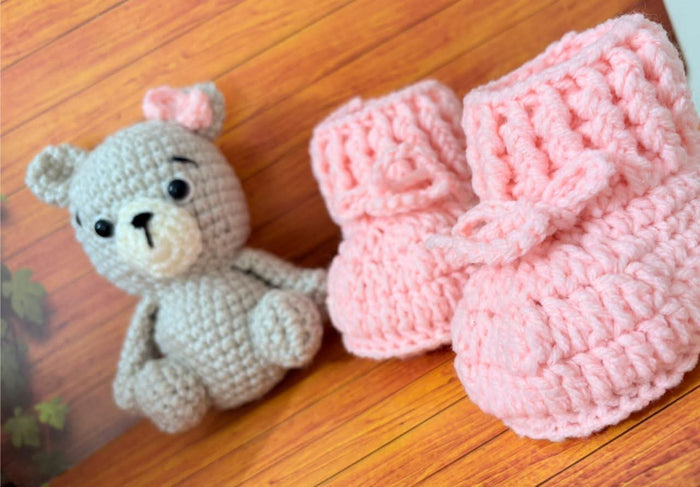 Crochet baby booties and bear set.