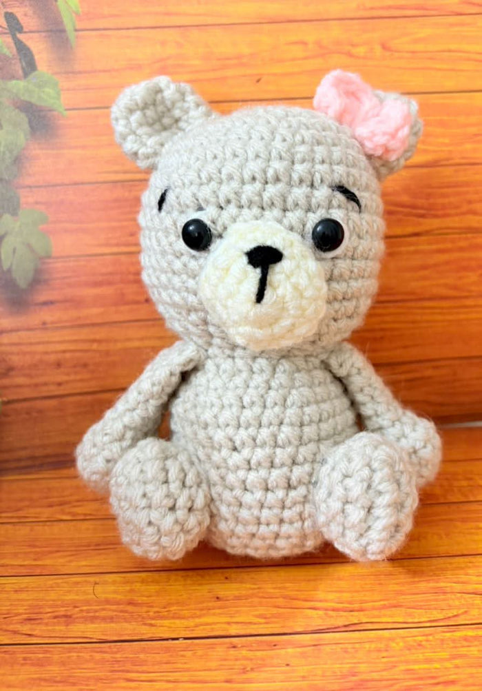 Crochet baby booties and bear set.