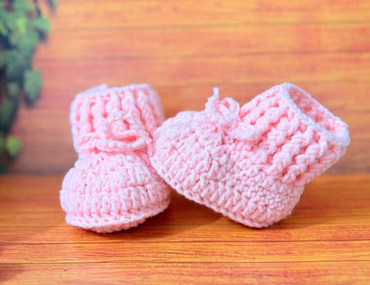 Crochet baby booties and bear set.