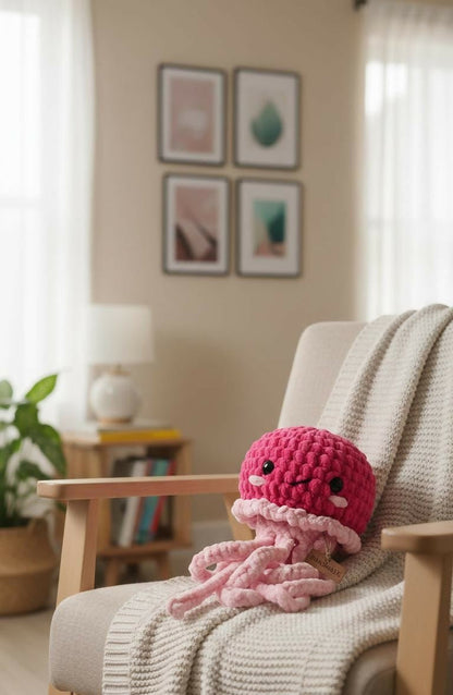 Pink crochet octopus toy on a chair with a cozy living room background