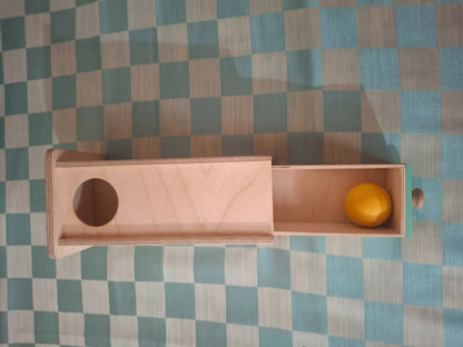 Curious cub object permanence box with drawer