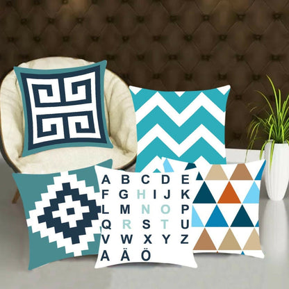 Set of decorative pillows with geometric patterns