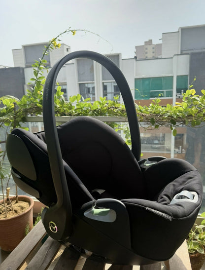 Cybex Cloud T Infant Car Seat with ergonomic reclining design, padded infant support, adjustable headrest, safety harness, side-impact protection, and comfortable seating for secure newborn and infant travel.