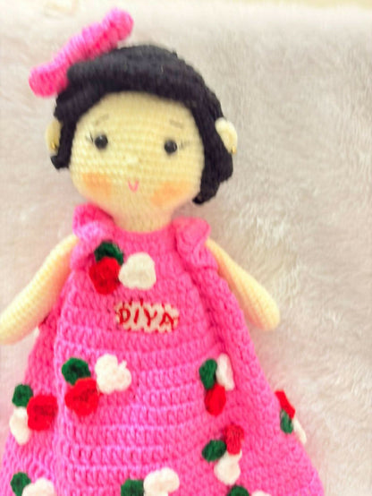 Personalised baby doll with soft hair and custom name embroidery – perfect gift for infants and toddlers.
