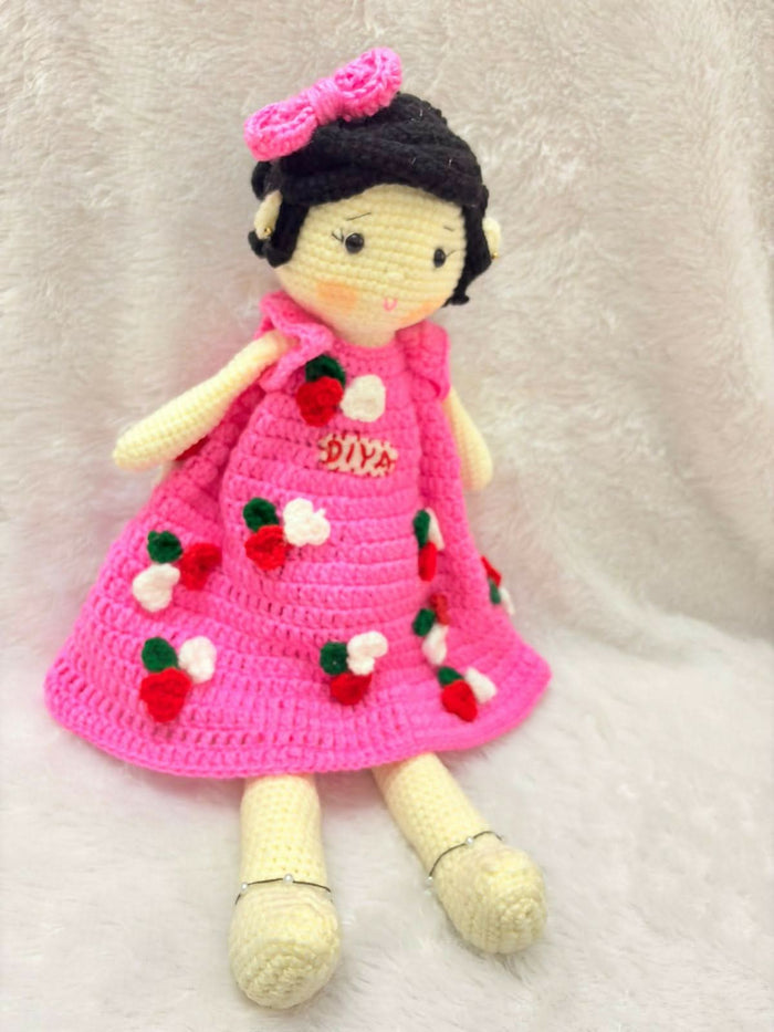 Personalised baby doll with soft hair and custom name embroidery – perfect gift for infants and toddlers.