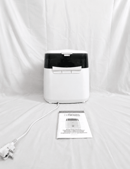 Dr. Brown's Deluxe electric steam bottle sterilizer with BPA-free construction, 6-bottle capacity, and spacious compartments for bottles, nipples, pacifiers, and baby feeding accessories.