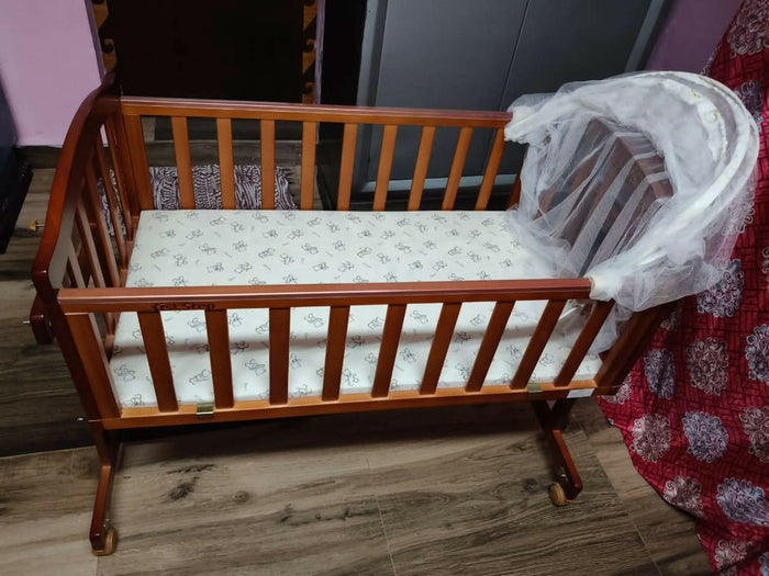 Give your baby a safe and stylish sleeping space with the versatile First Step Cradle perfect for a peaceful nursery!