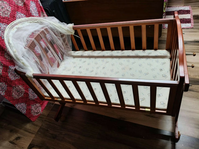 Give your baby a safe and stylish sleeping space with the versatile First Step Cradle perfect for a peaceful nursery!