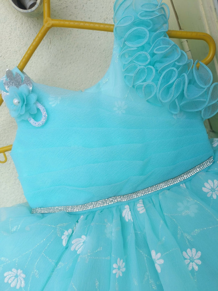 Light blue dress with floral details