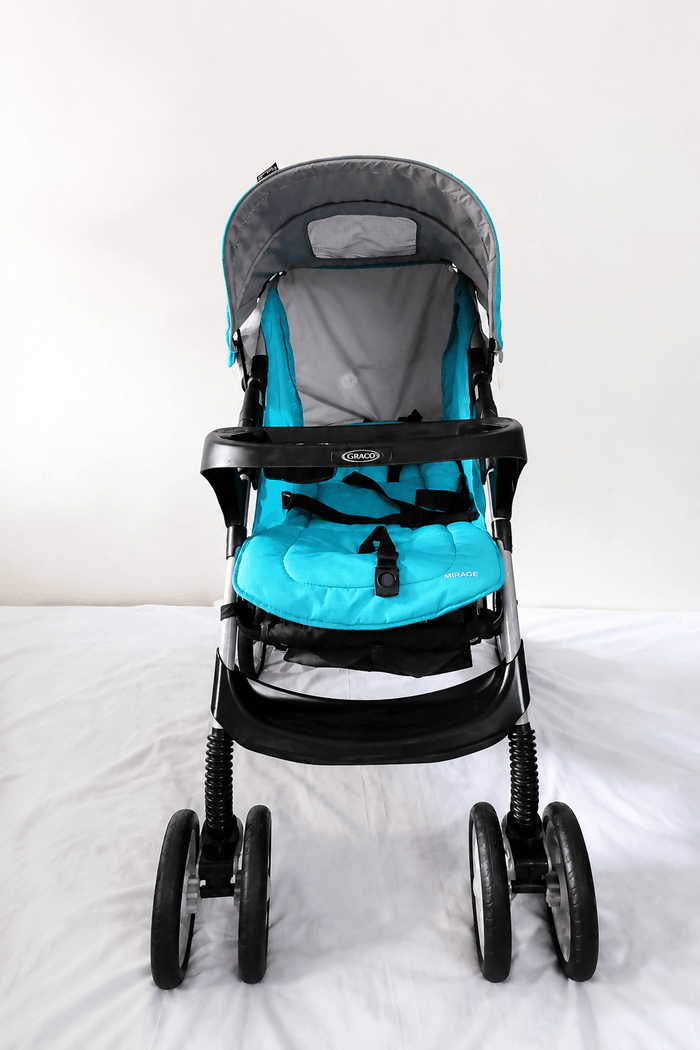 Graco Mirage Baby Stroller B121 with reclining seat, 5-point safety harness, foldable frame, protective canopy, smooth wheels, and comfortable seating for convenient everyday outings with babies and toddlers.