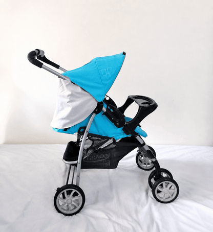 Graco Mirage Baby Stroller B121 with reclining seat, 5-point safety harness, foldable frame, protective canopy, smooth wheels, and comfortable seating for convenient everyday outings with babies and toddlers.
