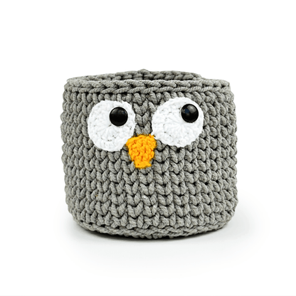 This adorable handmade crochet basket, crafted by skilled women artisans, brings the lovable yellow characters to life while adding playful functionality to your home.