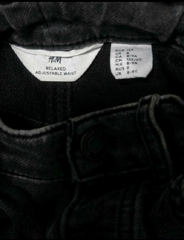 H&M Ripped Jeans in Some Used condition featuring a trendy distressed denim design, comfortable fit, and stylish casual look for everyday wear, outings, playdates, and casual occasions.
