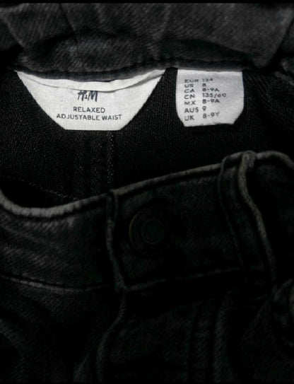 H&M Ripped Jeans in Some Used condition featuring a trendy distressed denim design, comfortable fit, and stylish casual look for everyday wear, outings, playdates, and casual occasions.