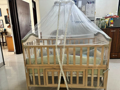 HUNY HUNY 15-in-1 baby cot and crib with mattress and mosquito net, convertible multifunctional nursery bed for newborns and infants.