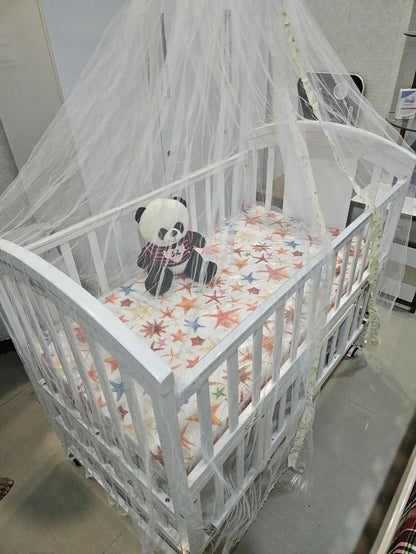 HUNYHUNY 15-in-1 pinewood cot crib with mattress and mosquito net, featuring sturdy wooden construction, convertible design, comfortable sleeping space, and secure support for babies.