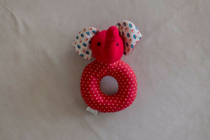 Introducing our Elephant Faced Shape Rattle, a delightful and eco-conscious sensory toy crafted with care and consideration.