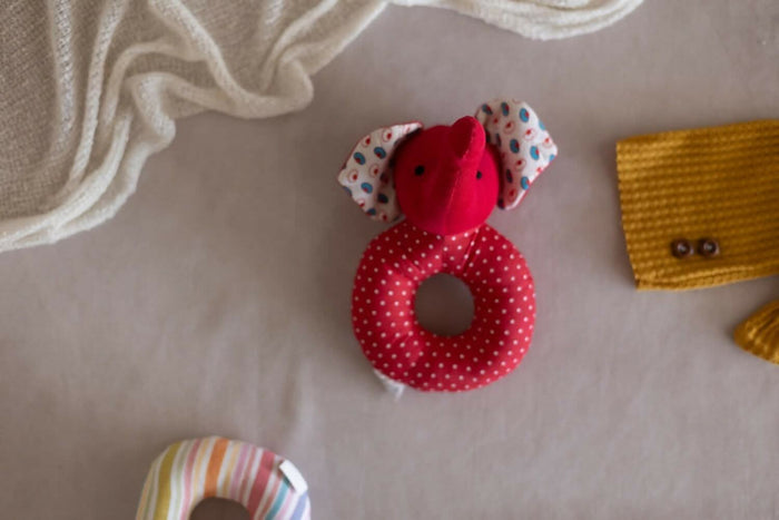 Introducing our Elephant Faced Shape Rattle, a delightful and eco-conscious sensory toy crafted with care and consideration.