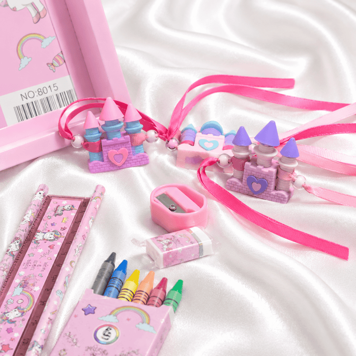 iLearnNGrow Unicorn Theme Stationery Rakhi Combo featuring a colorful unicorn pencil box set with a charming castle Rakhi, combining useful school stationery with festive Raksha Bandhan fun for kids.